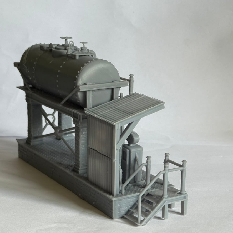 Opposite three-quarter view of the diesel fuelling station model showing the corrugated shelter and steps