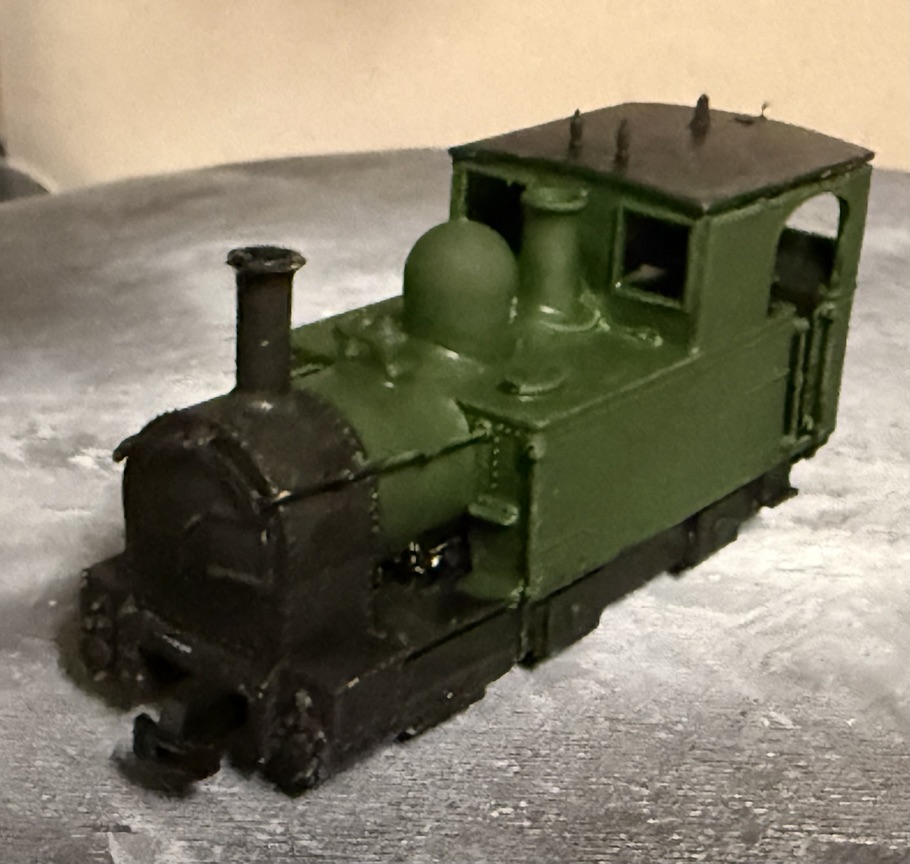 Painted green and black GWR Earl locomotive model shown from the front and side.