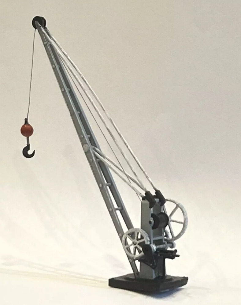 Full view of the printed wharfside crane with long jib, rigging, hook and winding wheels.