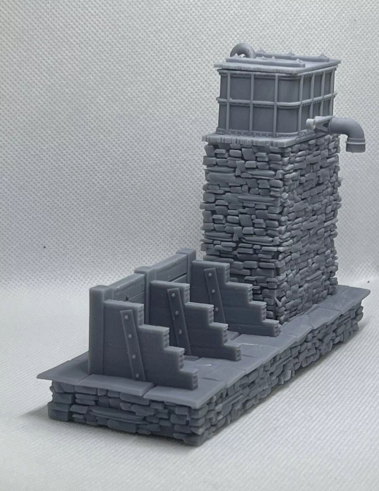 Angled view of the printed water tower and coaling stage showing the coal bays, stone tower and pipework.